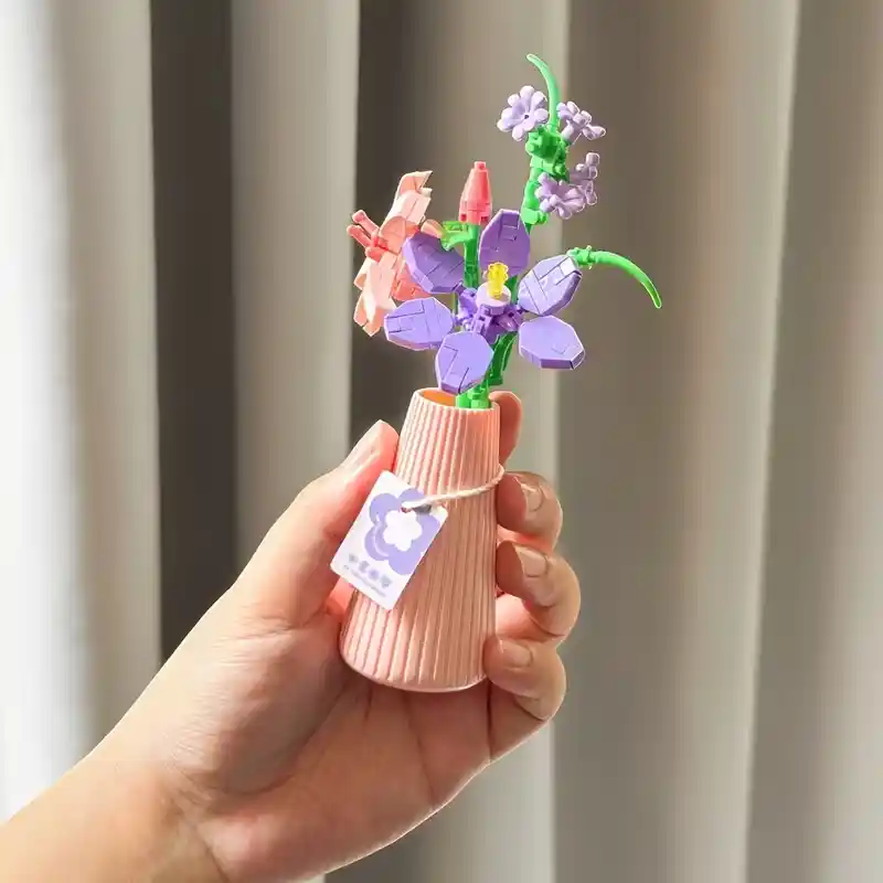 Flowers in a Tall Vase building blocks model held in a hand